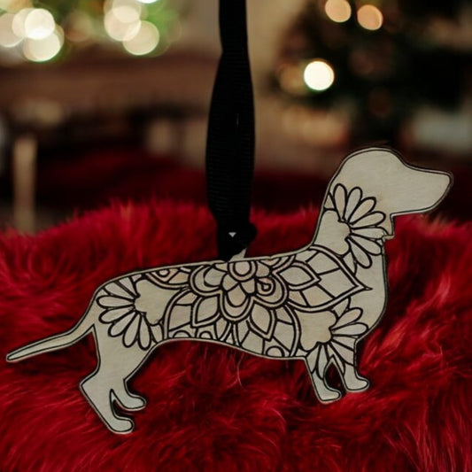 Dachshund wooden memorial dog ornament carved mandala design.  Hanging on a black ribbon