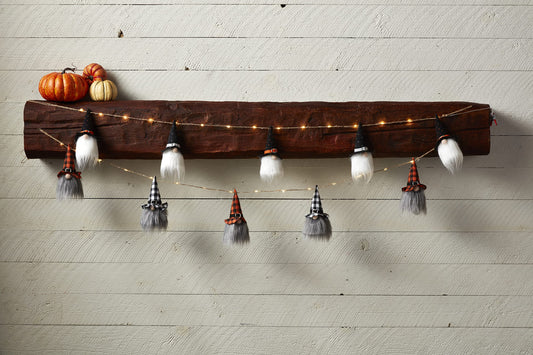 Guirnalda de gnomos iluminados de Halloween con forma de pastel de barro y puntos