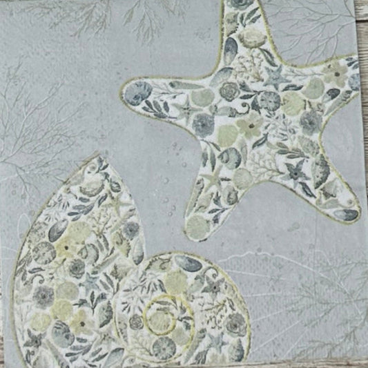 Decorative paper napkin with starfish and shell patterns 