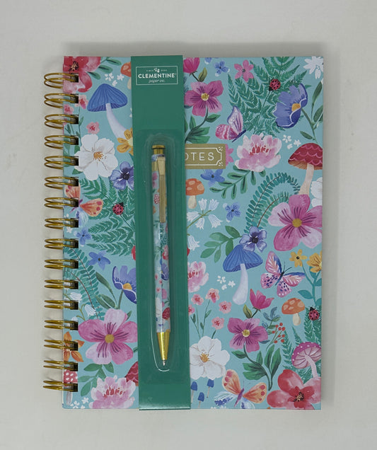 Libreta con flores azules y bolígrafo en papel Clementine